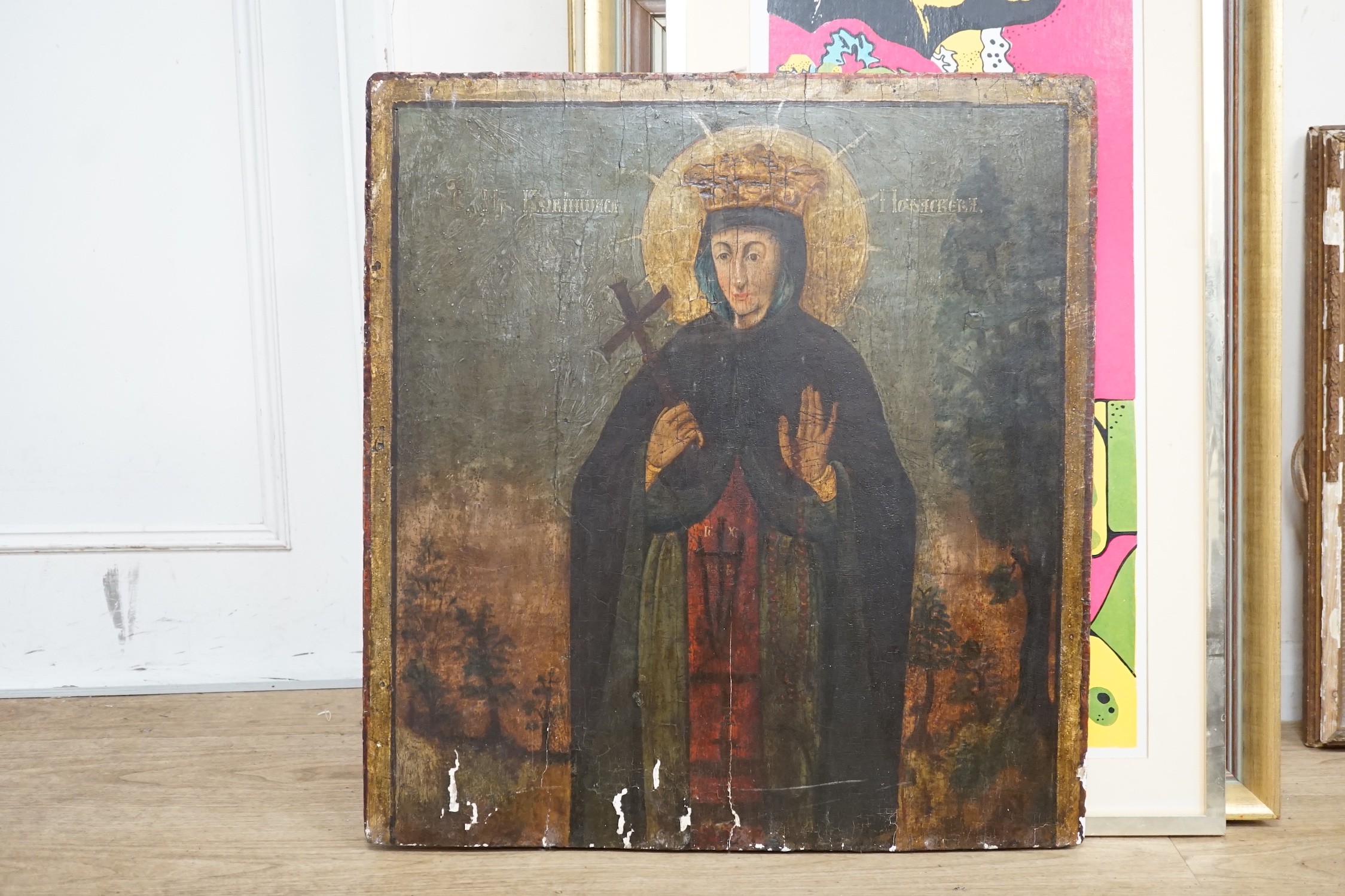 19th century Russian School, tempera on panel, Icon of a female saint, 62 x 58cm
